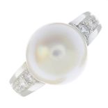 A cultured pearl and diamond ring.