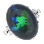 A black opal and diamond dress ring.
