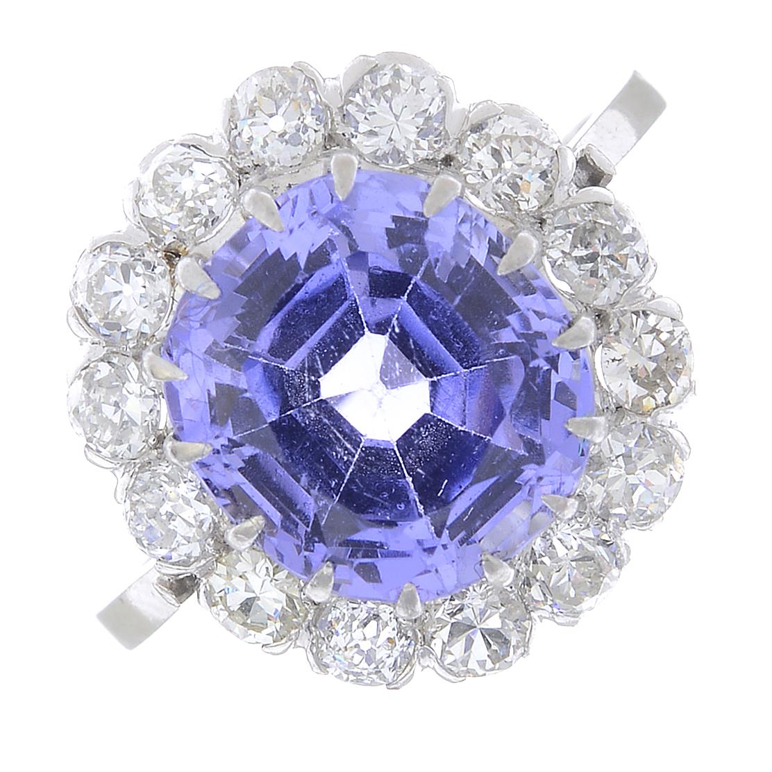 A Sri Lankan colour-change sapphire and diamond cluster ring.