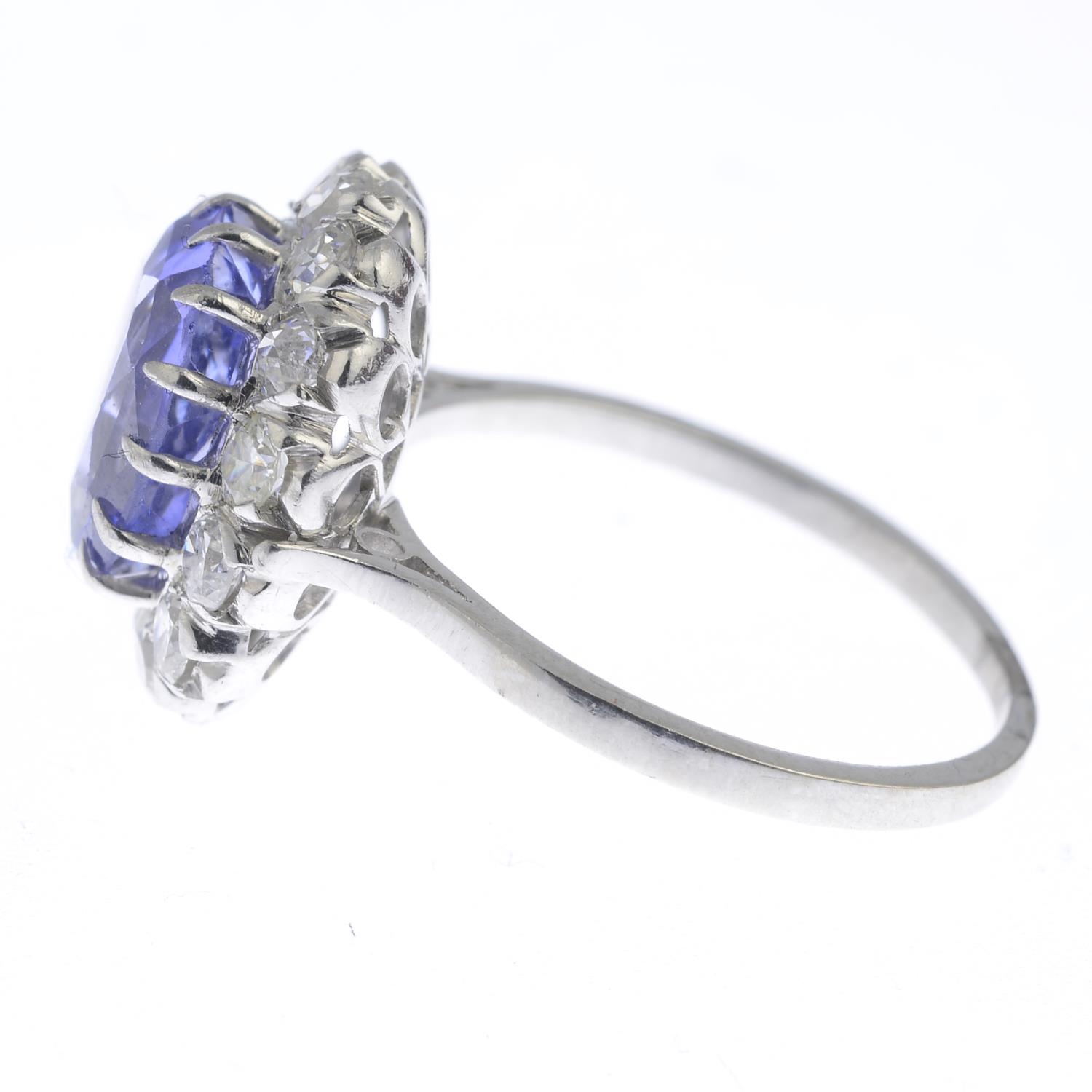 A Sri Lankan colour-change sapphire and diamond cluster ring. - Image 2 of 3