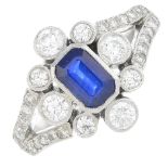 A sapphire and diamond cluster ring.