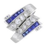 An Art Deco platinum, diamond and sapphire ring.