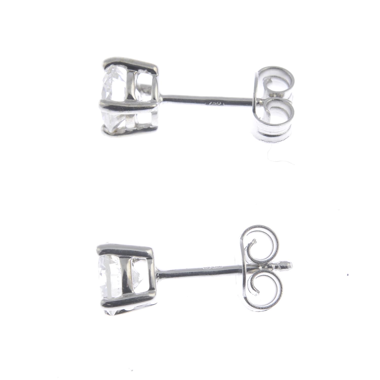 A pair of brilliant-cut diamond stud earrings. - Image 2 of 2