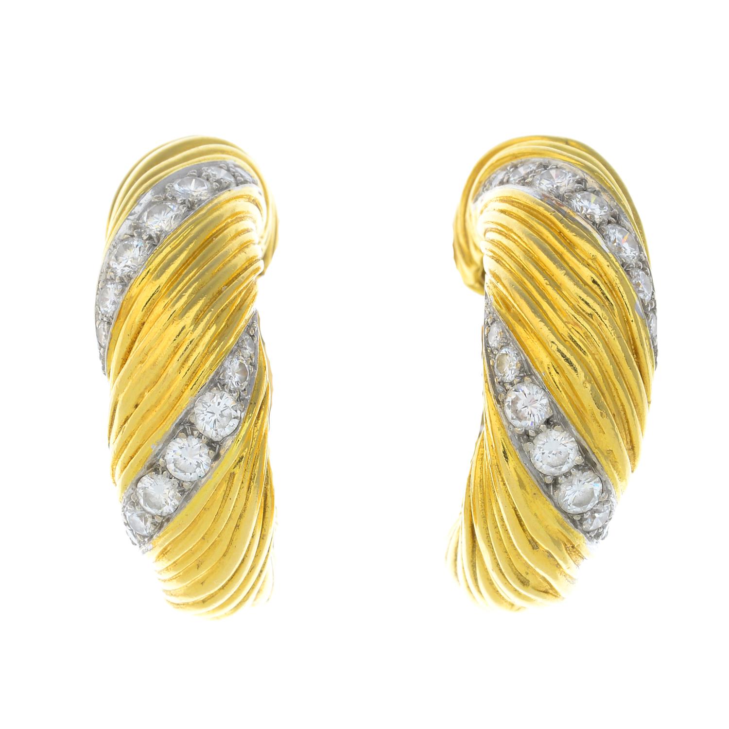 KUTCHINSKY - a pair of 1970s 18ct gold diamond earrings.