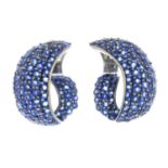 A pair of sapphire earrings.