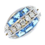 A mid 20th century 18ct gold and platinum diamond and topaz ring.