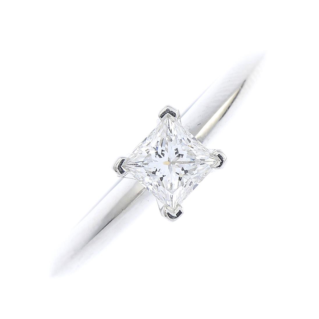 TIFFANY & CO. - a platinum diamond single-stone ring.