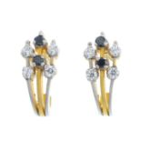 A pair of sapphire and cubic zirconia earrings.