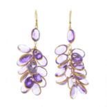 A pair of amethyst earrings.