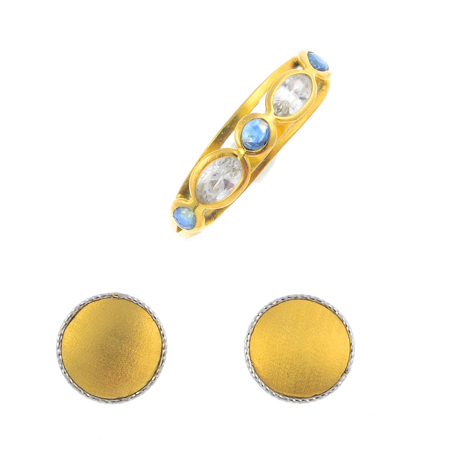 A gem-set ring and a pair of earrings.
