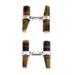 A pair of tiger's-eye cufflinks.