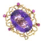 An amethyst and ruby dress ring.