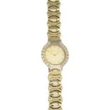 BUECHE GIROD - a lady's 9ct gold diamond watch.