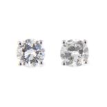 A pair of 18ct gold brilliant-cut diamond stud earrings.