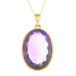 An amethyst pendant.