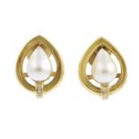 A pair of mabe pearl and diamond earrings.