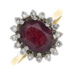 An 18ct gold garnet and cubic zirconia cluster ring.