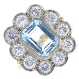 An 18ct gold aquamarine and diamond cluster ring.