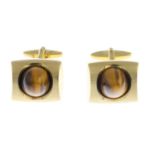 A pair of 9ct gold tiger-eye cufflinks.