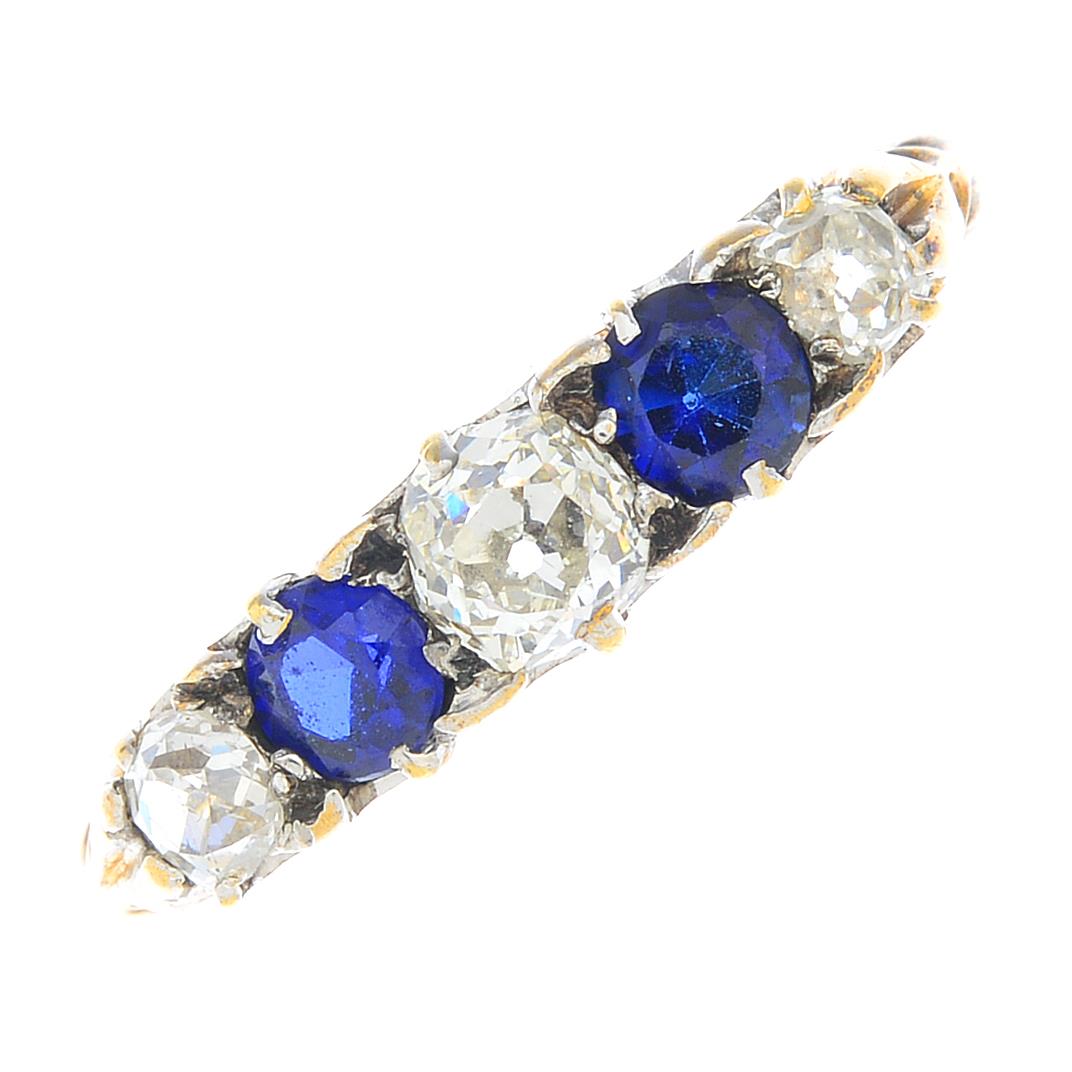 A diamond and sapphire five-stone ring.