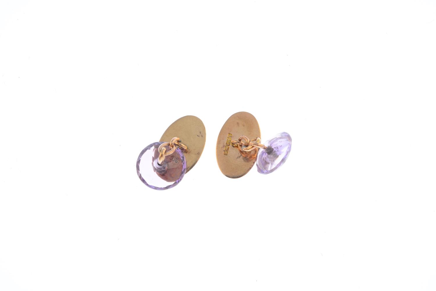 A pair of 1920's 9ct gold composite amethyst cufflinks. - Image 2 of 2
