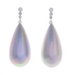 A pair of mother-of-pearl and diamond drop earrings.
