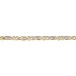 A 9ct gold diamond bracelet.