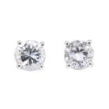 A pair of 18ct gold brilliant-cut diamond stud earrings.