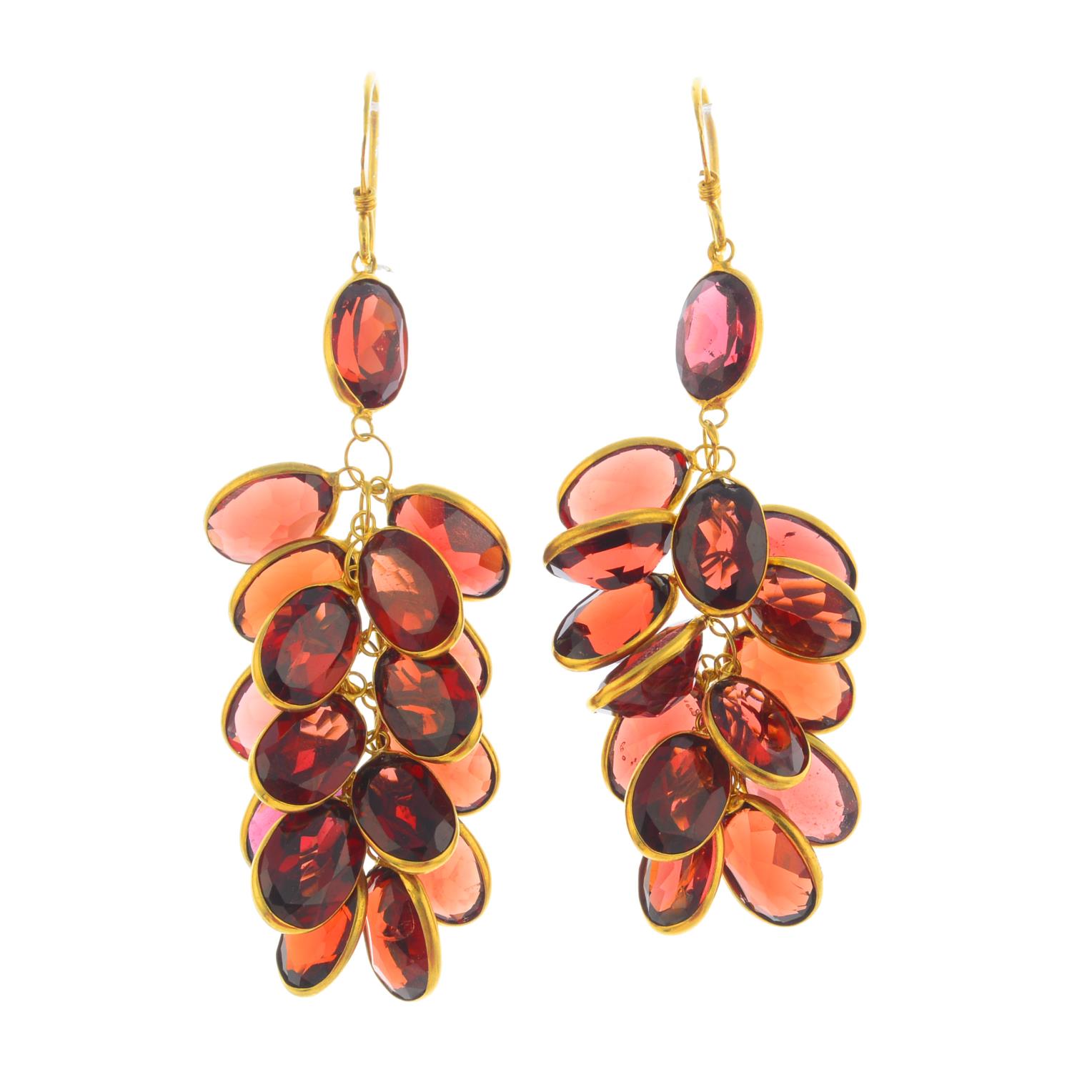 A pair of garnet earrings.