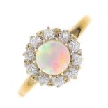 An early 20th century 18ct gold opal and diamond cluster ring.