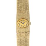 BUECHE GIROD - a lady's 9ct gold wrist watch.