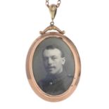 An early 20th century 9ct gold photograph pendant.