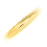 CARTIER - an 18ct gold band ring.