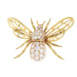 An 18ct gold cubic zirconia insect brooch.