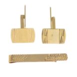 A pair of 9ct gold cufflinks and tie slide.