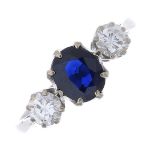 An 18ct gold sapphire and diamond three-stone ring.