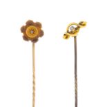 Two 15ct gold brooches and two diamond stickpins.