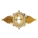 A late Victorian 15ct gold citrine and split pearl brooch.