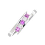 An 18ct gold pink sapphire and diamond dress ring.