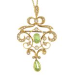An early 20th gold century peridot and split pearl pendant.