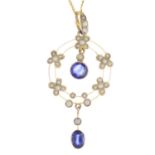 An early 20th century 9ct gold sapphire and split pearl pendant.