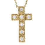 A 14ct gold cubic zirconia cross pendant.