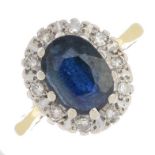 An 18ct gold sapphire and diamond cluster ring.