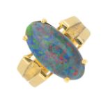 An opal triplet single-stone ring.