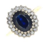 A sapphire and diamond cluster ring.