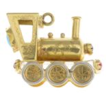 A mid 20th century 18ct gold train charm.