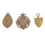 Three early 20th century 9ct gold medallions.