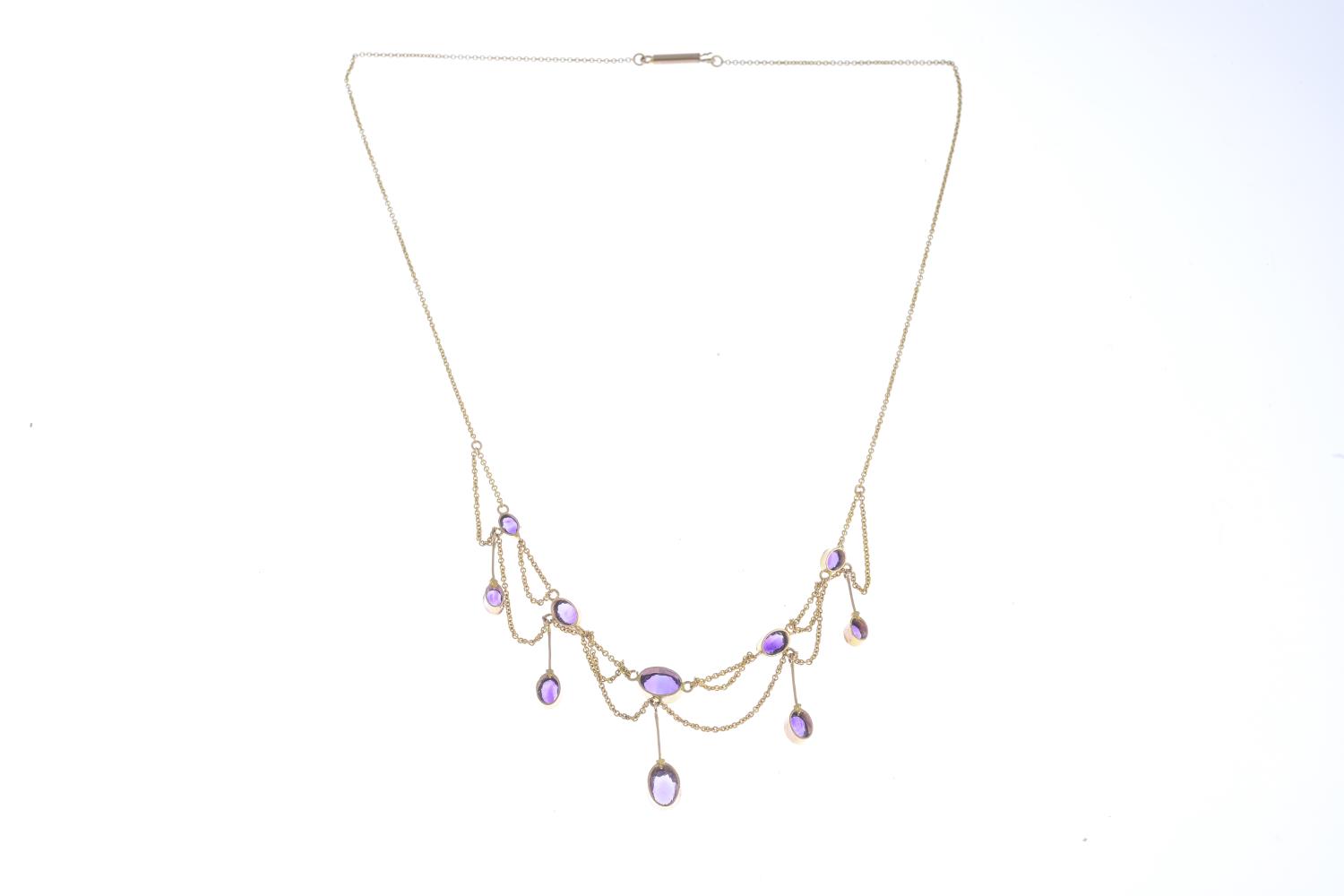 An amethyst necklace. - Image 3 of 3