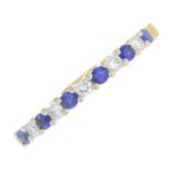 An 18ct gold sapphire and diamond half eternity ring.