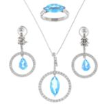 A set of blue topaz and diamond jewellery.